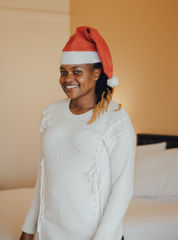 young beautiful woman smiling wearing a christmas 2024 11 29 13 02 00 utc