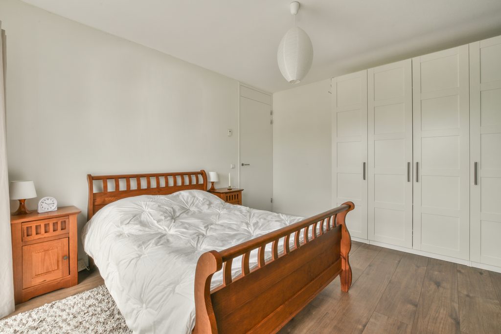 spacious bright bedroom with a minimalist bedside 2026 09 22 12 56 05 utc